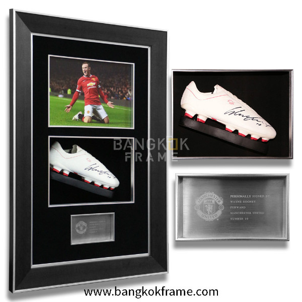 soccer shoes in shadow box